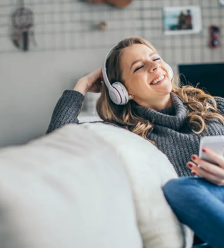What We’re Listening to in 2024: Top Podcasts to Tune Into