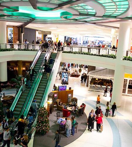 People shopping in a mall in the 1990s