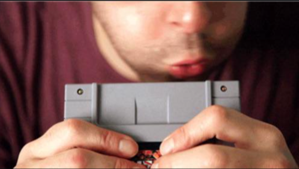 Blowing on Video Game Cartridges